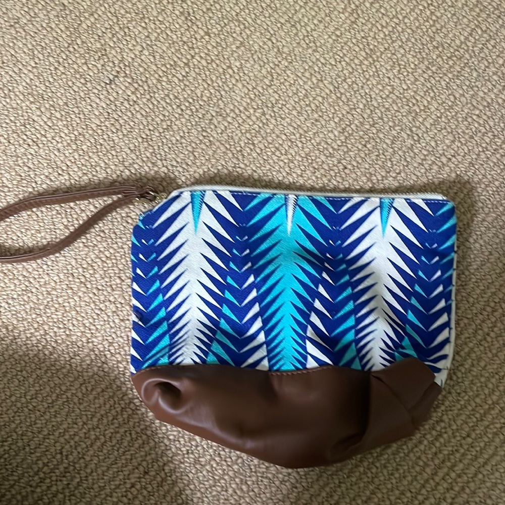 Macbeth collection by Margaret Joseph’s wristlet pouch